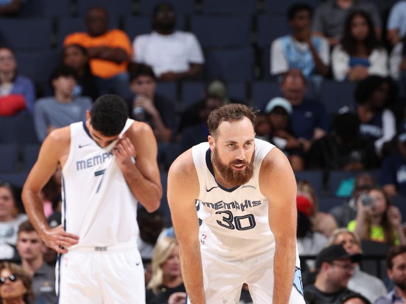 MEMPHIS, TN - OCTOBER 10: Jay Huff #30 of the Memphis Grizzlies looks on during the game against the Charlotte Hornets during a NBA Preseason game on October 10, 2024 at FedExForum in Memphis, Tennessee. NOTE TO USER: User expressly acknowledges and agrees that, by downloading and or using this photograph, User is consenting to the terms and conditions of the Getty Images License Agreement. Mandatory Copyright Notice: Copyright 2024 NBAE (Photo by Joe Murphy/NBAE via Getty Images)