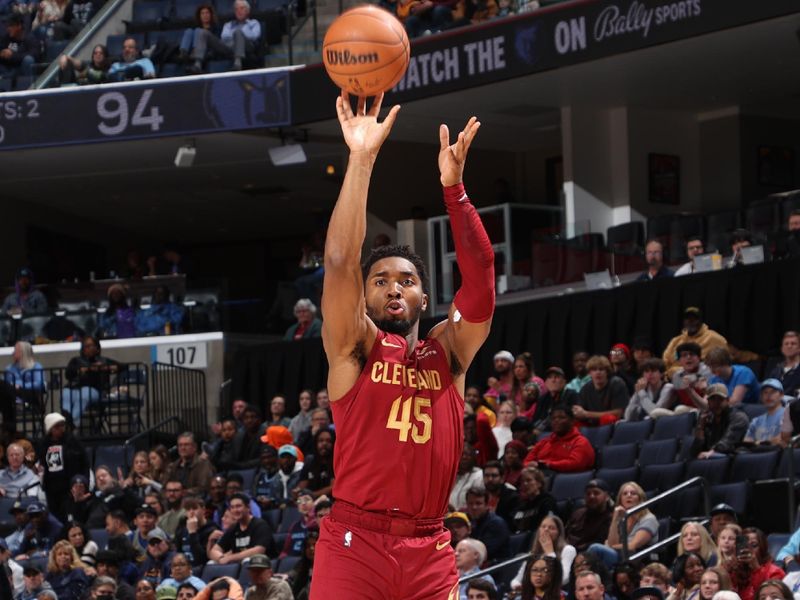 MEMPHIS, TN - FEBRUARY 1:  Donovan Mitchell #45 of the Cleveland Cavaliers shoots the ball during the game  against the Memphis Grizzlies on February 1, 2024 at FedExForum in Memphis, Tennessee. NOTE TO USER: User expressly acknowledges and agrees that, by downloading and or using this photograph, User is consenting to the terms and conditions of the Getty Images License Agreement. Mandatory Copyright Notice: Copyright 2024 NBAE (Photo by Joe Murphy/NBAE via Getty Images)