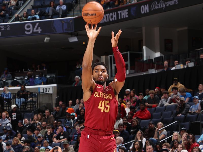 MEMPHIS, TN - FEBRUARY 1:  Donovan Mitchell #45 of the Cleveland Cavaliers shoots the ball during the game  against the Memphis Grizzlies on February 1, 2024 at FedExForum in Memphis, Tennessee. NOTE TO USER: User expressly acknowledges and agrees that, by downloading and or using this photograph, User is consenting to the terms and conditions of the Getty Images License Agreement. Mandatory Copyright Notice: Copyright 2024 NBAE (Photo by Joe Murphy/NBAE via Getty Images)