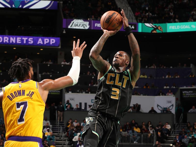 CHARLOTTE, NC - JANUARY 2: Terry Rozier #3 of the Charlotte Hornets shoots the ball during the game against the Los Angeles Lakers on January 2, 2023 at Spectrum Center in Charlotte, North Carolina. NOTE TO USER: User expressly acknowledges and agrees that, by downloading and or using this photograph, User is consenting to the terms and conditions of the Getty Images License Agreement. Mandatory Copyright Notice: Copyright 2023 NBAE (Photo by Kent Smith/NBAE via Getty Images)