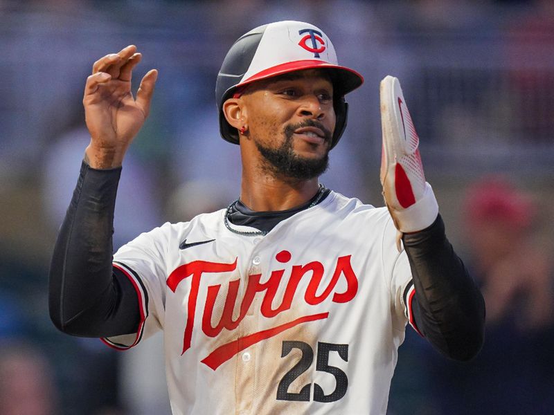 May 28, 2024; Minneapolis, Minnesota, USA; Minnesota Twins outfielder Byron Buxton (25) celebrates his run against the Kansas City Royals in the eighth inning at Target Field. Mandatory Credit: Brad Rempel-USA TODAY Sports