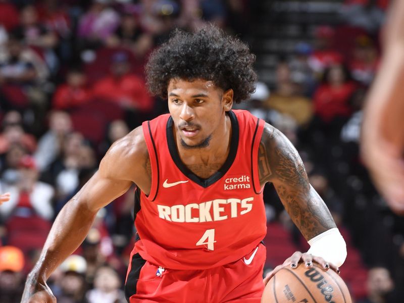 HOUSTON, TX - MARCH 25: Jalen Green #4 of the Houston Rockets handles the ball during the game against the Portland Trail Blazers on March 25, 2024 at the Toyota Center in Houston, Texas. NOTE TO USER: User expressly acknowledges and agrees that, by downloading and or using this photograph, User is consenting to the terms and conditions of the Getty Images License Agreement. Mandatory Copyright Notice: Copyright 2024 NBAE (Photo by Logan Riely/NBAE via Getty Images)