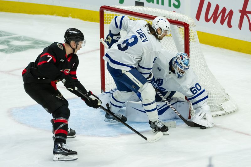 Jan 25, 2025; Ottawa, Ontario, CAN; Toronto Maple Leafs goalie Joseph Woll (60) makes a save in front of Ottawa Senators left wing Brady Tkachuk (7) in the third period at the Canadian Tire Centre. Mandatory Credit: Marc DesRosiers-Imagn Images