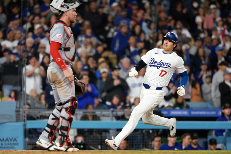 May 17, 2024; Los Angeles, California, USA;  Los Angeles Dodgers designated hitter Shohei Ohtani (17) scores a run during the seventh inning against the Cincinnati Reds at Dodger Stadium. Mandatory Credit: Kiyoshi Mio-USA TODAY Sports