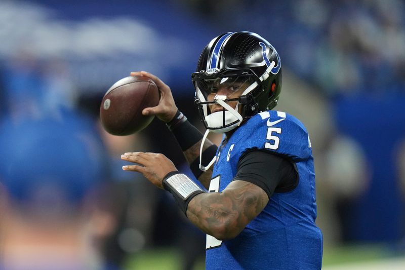 Indianapolis Colts quarterback Anthony Richardson throws during pregame of an NFL football game against the Detroit Lions, Sunday, Nov. 24, 2024, in Indianapolis. (AP Photo/AJ Mast)