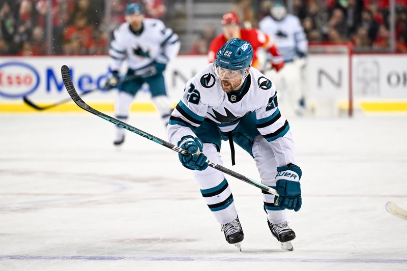 Feb 15, 2024; Calgary, Alberta, CAN; San Jose Sharks center Ryan Carpenter (22) skates against the Calgary Flames during the first period at Scotiabank Saddledome. Mandatory Credit: Brett Holmes-USA TODAY Sports