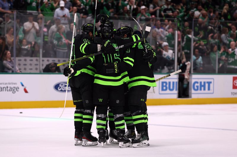 Apr 13, 2024; Dallas, Texas, USA; Dallas Stars players celebrate a power play goal against the Seattle Kraken in the second period at American Airlines Center. Mandatory Credit: Tim Heitman-USA TODAY Sports