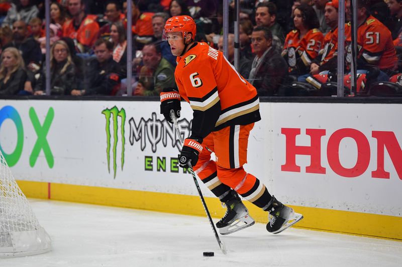 Oct 16, 2024; Anaheim, California, USA; Anaheim Ducks defenseman Brian Dumoulin (6) controls the puck against Utah Hockey Club during the first period at Honda Center. Mandatory Credit: Gary A. Vasquez-Imagn Images