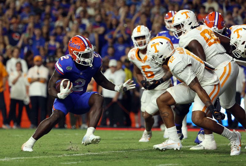 Sep 16, 2023; Gainesville, Florida, USA;Florida Gators running back Montrell Johnson Jr. (2) runs the ball in for a touchdown against the Tennessee Volunteers  during the second quarter at Ben Hill Griffin Stadium. Mandatory Credit: Kim Klement Neitzel-USA TODAY Sports