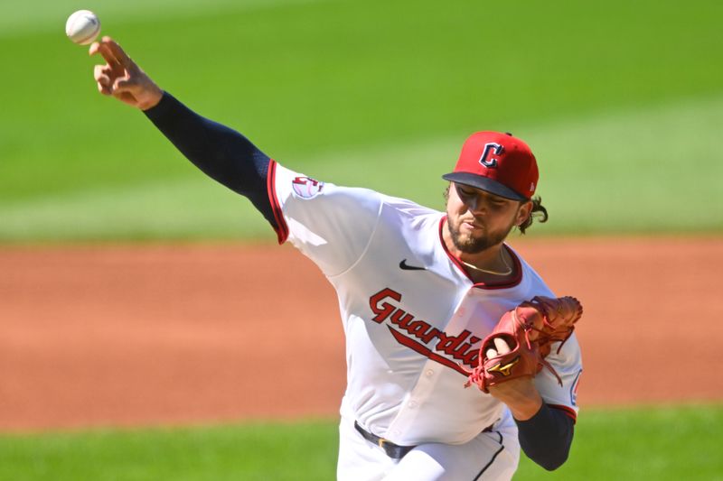 Jun 28, 2025; Cleveland, Ohio, USA; Cleveland Guardians starting pitcher Slade Cecconi (44) delivers a pitch in the first inning against the St. Louis Cardinals at Progressive Field. Mandatory Credit: David Richard-Imagn Images