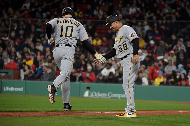 Apr 4, 2023; Boston, Massachusetts, USA;  Pittsburgh Pirates center fielder Bryan Reynolds (10) is congratulated by third base coach Mike Rabelo (58) after hitting a home run during the third inning against the Boston Red Sox at Fenway Park. Mandatory Credit: Bob DeChiara-USA TODAY Sports