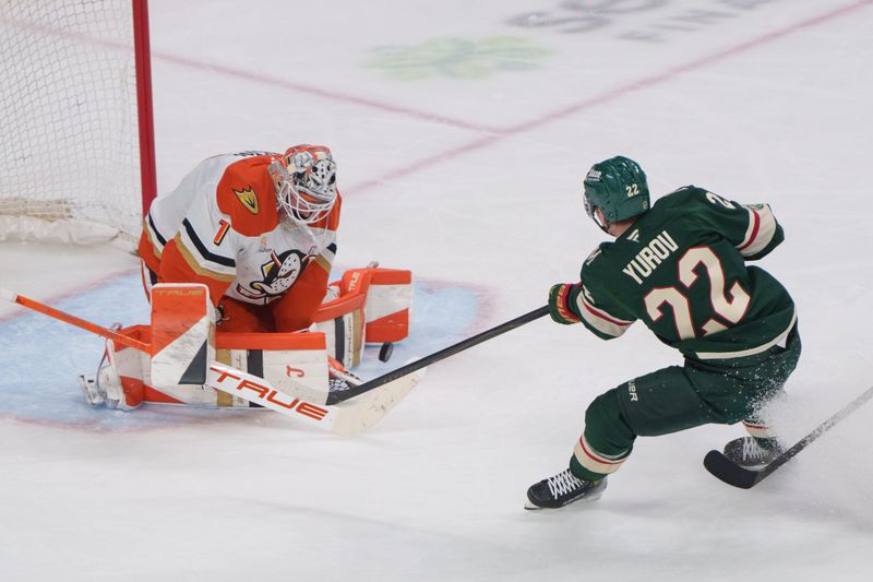 Apr 14, 2026; Saint Paul, Minnesota, USA; Minnesota Wild right wing Danila Yurov (22) has a shot stopped by Anaheim Ducks goaltender Lukas Dostal (1) in the second period at Grand Casino Arena. Mandatory Credit: Matt Blewett-Imagn Images