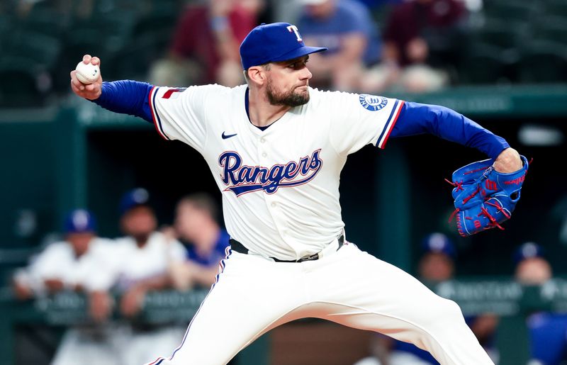 May 27, 2025; Arlington, Texas, USA; Texas Rangers starting pitcher Nathan Eovaldi (17) throws during the first inning against the Toronto Blue Jays at Globe Life Field. Mandatory Credit: Kevin Jairaj-Imagn Images