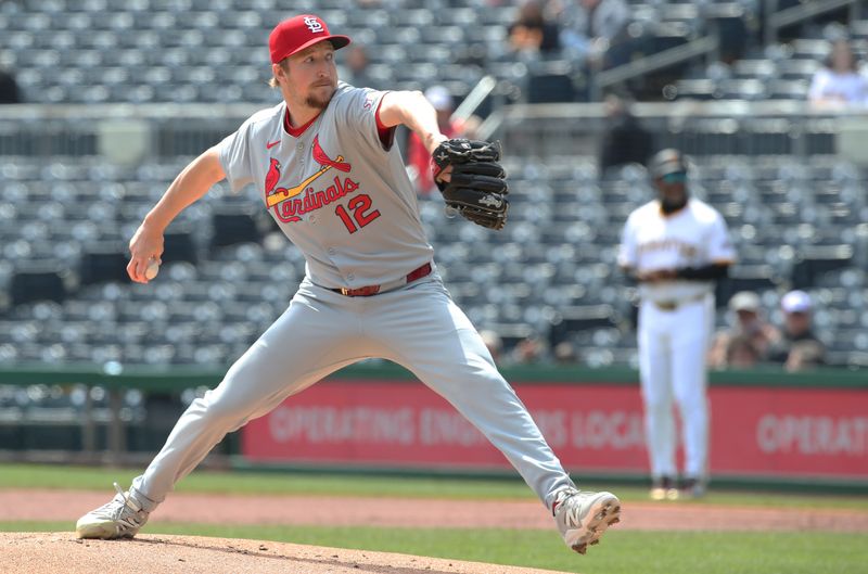 Apr 9, 2025; Pittsburgh, Pennsylvania, USA;  St. Louis Cardinals starting pitcher Erick Fedde (12) delivers a pitch against the Pittsburgh Pirates during the first inning at PNC Park. Mandatory Credit: Charles LeClaire-Imagn Images