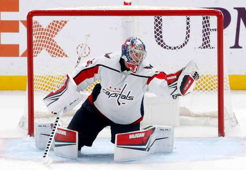 Jan 2, 2024; Pittsburgh, Pennsylvania, USA;  Washington Capitals goaltender Darcy Kuemper (35) makes a glove save against the Pittsburgh Penguins during the third period at PPG Paints Arena. Mandatory Credit: Charles LeClaire-USA TODAY Sports