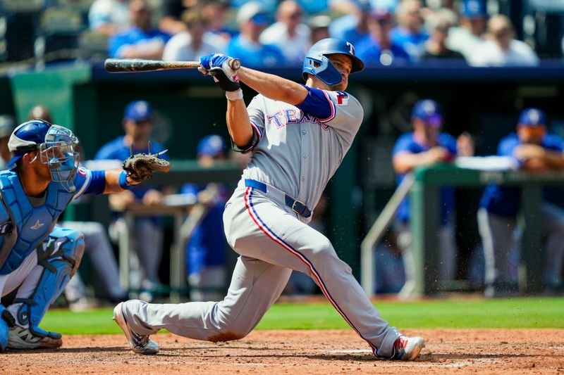 Aug 21, 2025; Kansas City, Missouri, USA; Texas Rangers shortstop Corey Seager (5) bats during the sixth inning against the Kansas City Royals at Kauffman Stadium. Mandatory Credit: Jay Biggerstaff-Imagn Images Aug 21, 2025; Kansas City, Missouri, USA; Texas Rangers shortstop Corey Seager (5) bats during the sixth inning against the Kansas City Royals at Kauffman Stadium. Mandatory Credit: Jay Biggerstaff-Imagn Images