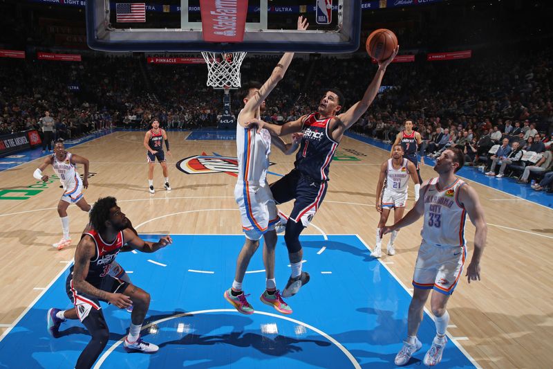 OKLAHOMA CITY, OK - FEBRUARY 23: Johnny Davis #1 of the Washington Wizards drives to the basket during the game against the Oklahoma City Thunder on February 23, 2024 at Paycom Arena in Oklahoma City, Oklahoma. NOTE TO USER: User expressly acknowledges and agrees that, by downloading and or using this photograph, User is consenting to the terms and conditions of the Getty Images License Agreement. Mandatory Copyright Notice: Copyright 2024 NBAE (Photo by Zach Beeker/NBAE via Getty Images)