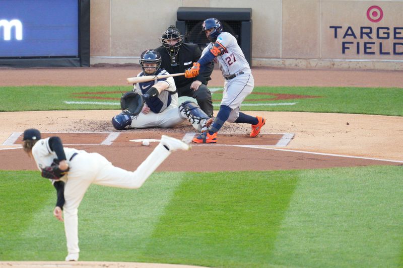 Oct 11, 2023; Minneapolis, Minnesota, USA; Houston Astros second baseman Jose Altuve (27) hits a ground ball in the first inning against the Minnesota Twins during game four of the ALDS for the 2023 MLB playoffs at Target Field. Mandatory Credit: Matt Blewett-USA TODAY Sports