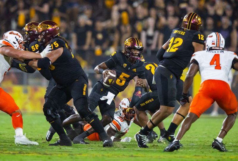 Sep 9, 2023; Tempe, Arizona, USA; Arizona State Sun Devils quarterback Jaden Rashada (5) against the Oklahoma State Cowboys in the first half at Mountain America Stadium. Mandatory Credit: Mark J. Rebilas-USA TODAY Sports