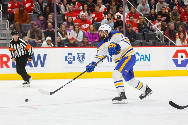 Nov 2, 2024; Detroit, Michigan, USA; Buffalo Sabres right wing Alex Tuch (89) shoots the puck for a goal during the first period of the game against the Detroit Red Wings at Little Caesars Arena. Mandatory Credit: Brian Bradshaw Sevald-Imagn Images