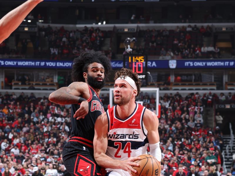 CHICAGO, IL - MARCH 25: Corey Kispert #24 of the Washington Wizards drives to the basket during the game against the Chicago Bulls  on March 25, 2024 at United Center in Chicago, Illinois. NOTE TO USER: User expressly acknowledges and agrees that, by downloading and or using this photograph, User is consenting to the terms and conditions of the Getty Images License Agreement. Mandatory Copyright Notice: Copyright 2024 NBAE (Photo by Jeff Haynes/NBAE via Getty Images)