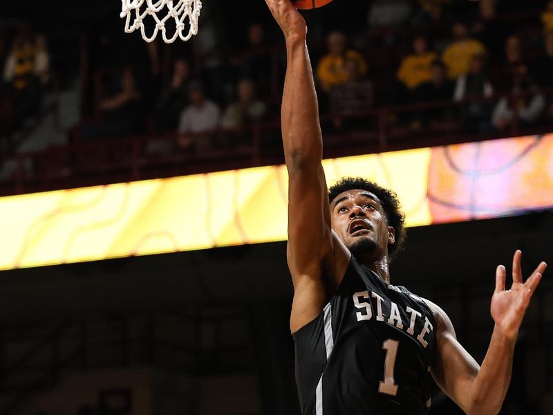 Dec 11, 2022; Minneapolis, Minnesota, USA; Mississippi State Bulldogs forward Tolu Smith (1) goes for a layup against the Minnesota Golden Gophers during the second half at Williams Arena. Mandatory Credit: Matt Krohn-USA TODAY Sports