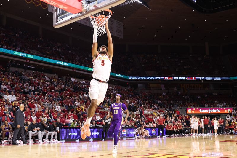 Dec 3, 2025; Ames, Iowa, USA; Iowa State Cyclones forward Joshua Jefferson (5) dunks against the Alcorn State Braves during the first half at James H. Hilton Coliseum. Mandatory Credit: Reese Strickland-Imagn Images
