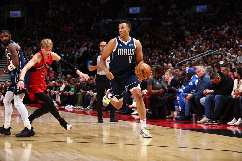 TORONTO, CANADA - FEBRUARY 28: Dante Exum #0 of the Dallas Mavericks dribbles the ball during the game against the Toronto Raptors on February 28, 2024 at the Scotiabank Arena in Toronto, Ontario, Canada.  NOTE TO USER: User expressly acknowledges and agrees that, by downloading and or using this Photograph, user is consenting to the terms and conditions of the Getty Images License Agreement.  Mandatory Copyright Notice: Copyright 2024 NBAE (Photo by Vaughn Ridley/NBAE via Getty Images)