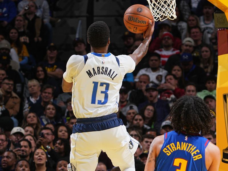 DENVER, CO - NOVEMBER 22: Naji Marshall #13 of the Dallas Mavericks drives to the basket during the game against the Denver Nuggets during the Emirates NBA Cup game on November 22, 2024 at Ball Arena in Denver, Colorado. NOTE TO USER: User expressly acknowledges and agrees that, by downloading and/or using this Photograph, user is consenting to the terms and conditions of the Getty Images License Agreement. Mandatory Copyright Notice: Copyright 2024 NBAE (Photo by Garrett Ellwood/NBAE via Getty Images)