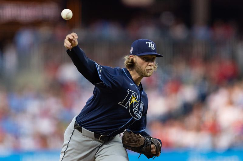 Sep 11, 2024; Philadelphia, Pennsylvania, USA; Tampa Bay Rays pitcher Shane Baz (11) throws a pitch during the first inning against the Philadelphia Phillies at Citizens Bank Park. Mandatory Credit: Bill Streicher-Imagn Images