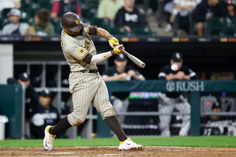 Sep 29, 2023; Chicago, Illinois, USA; San Diego Padres shortstop Xander Bogaerts (2) singles against the Chicago White Sox during the eight inning at Guaranteed Rate Field. Mandatory Credit: Kamil Krzaczynski-USA TODAY Sports