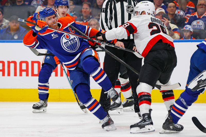 Mar 3, 2026; Edmonton, Alberta, CAN; Ottawa Senators forward Claude Giroux (28) trips up Edmonton Oilers forward Connor McDavid (97) during the third period at Rogers Place. Mandatory Credit: Perry Nelson-Imagn Images