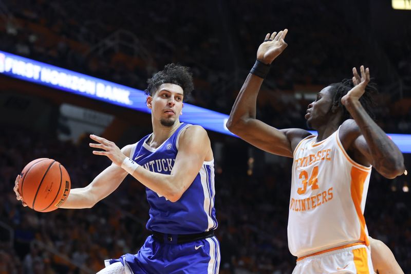 Jan 28, 2025; Knoxville, Tennessee, USA; Kentucky Wildcats guard Koby Brea (4) passes the ball against Tennessee Volunteers forward Felix Okpara (34) during the second half at Thompson-Boling Arena at Food City Center. Mandatory Credit: Randy Sartin-Imagn Images