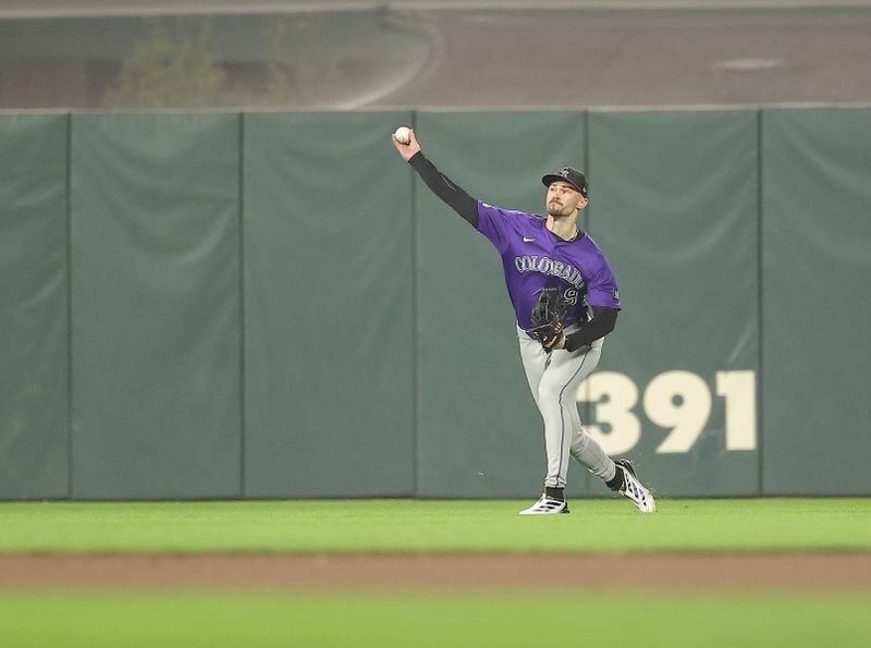 Sep 26, 2025; San Francisco, California, USA; Colorado Rockies center fielder Brenton Doyle (9) throws the ball in field against the San Francisco Giants during the seventh inning at Oracle Park. Mandatory Credit: Kelley L Cox-Imagn Images