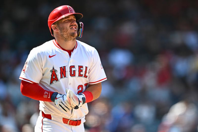 Aug 3, 2025; Anaheim, California, USA; Los Angeles Angels outfielder Mike Trout (27) is intentionally walked against the Chicago White Sox during the seventh inning at Angel Stadium. Mandatory Credit: Jonathan Hui-Imagn Images