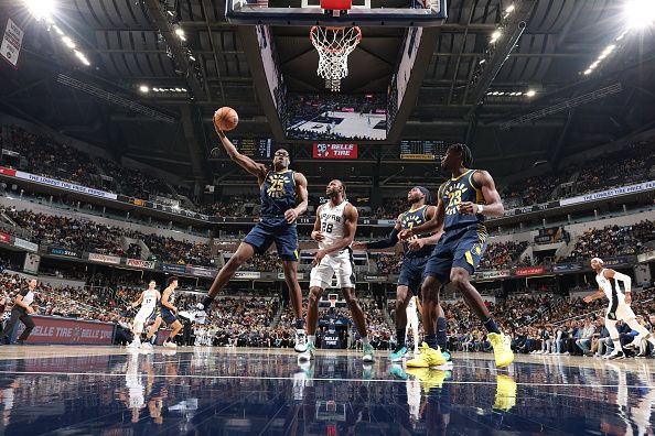 INDIANAPOLIS, IN - NOVEMBER 6: Jalen Smith #25 of the Indiana Pacers grabs a rebound during the game against the San Antonio Spurs on November 6, 2023 at Gainbridge Fieldhouse in Indianapolis, Indiana. NOTE TO USER: User expressly acknowledges and agrees that, by downloading and or using this Photograph, user is consenting to the terms and conditions of the Getty Images License Agreement. Mandatory Copyright Notice: Copyright 2023 NBAE (Photo by Jeff Haynes/NBAE via Getty Images)