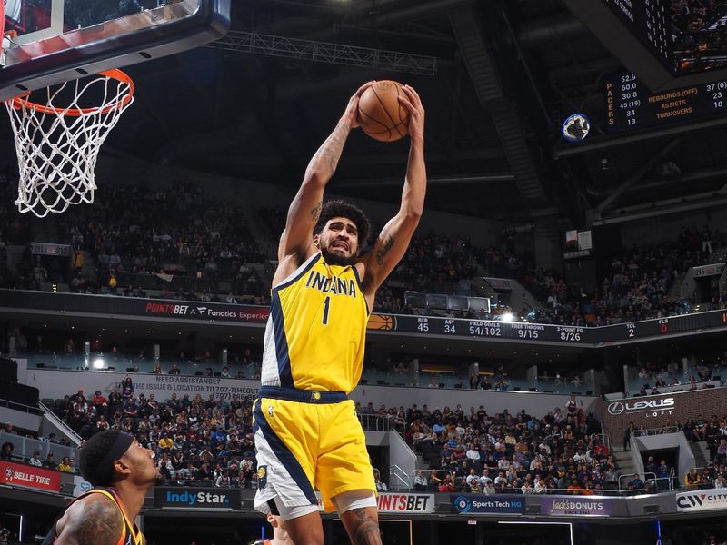 INDIANAPOLIS, IN - JANUARY 26: Obi Toppin #1 of the Indiana Pacers rebounds the ball during the game against the Phoenix Suns on January 26, 2024 at Gainbridge Fieldhouse in Indianapolis, Indiana. NOTE TO USER: User expressly acknowledges and agrees that, by downloading and or using this Photograph, user is consenting to the terms and conditions of the Getty Images License Agreement. Mandatory Copyright Notice: Copyright 2024 NBAE (Photo by Ron Hoskins/NBAE via Getty Images)