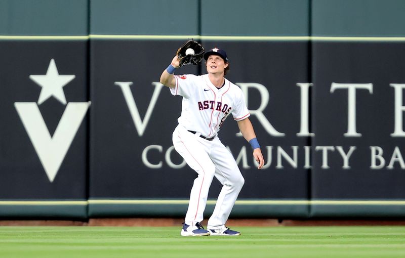 May 2, 2023; Houston, Texas, USA; Houston Astros center fielder Jake Meyers (6) catches a fly ball against the San Francisco Giants during the third inning at Minute Maid Park. Mandatory Credit: Erik Williams-USA TODAY Sports