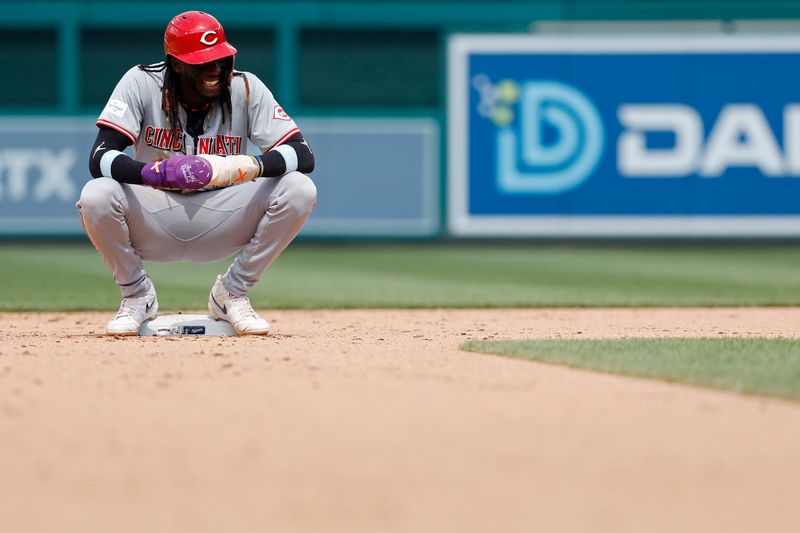 Jul 21, 2024; Washington, District of Columbia, USA; Cincinnati Reds shortstop Elly De La Cruz (44) kneels at sec and base during a mound visit against the Washington Nationals during the eighth inning at Nationals Park. Mandatory Credit: Geoff Burke-USA TODAY Sports