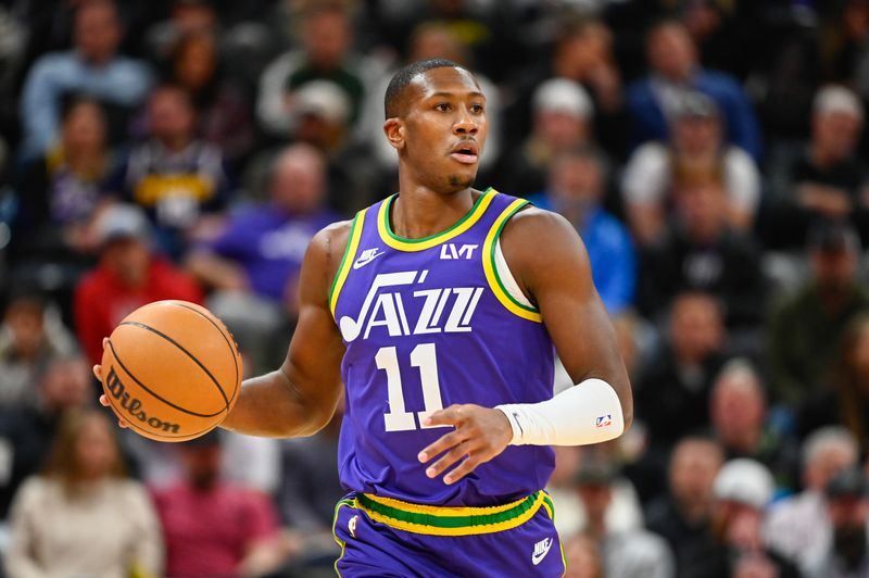 SALT LAKE CITY, UTAH - JANUARY 10: Kris Dunn #11 of the Utah Jazz looks for a pass during the first half of a game against the Denver Nuggets at Delta Center on January 10, 2024 in Salt Lake City, Utah. NOTE TO USER: User expressly acknowledges and agrees that, by downloading and or using this photograph, User is consenting to the terms and conditions of the Getty Images License Agreement. (Photo by Alex Goodlett/Getty Images)