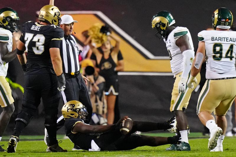 Sep 16, 2023; Boulder, Colorado, USA; Colorado State Rams defensive lineman Mohamed Kamara (8) reacts after sacking Colorado Buffaloes quarterback Shedeur Sanders (2) in the second quarter at Folsom Field. Mandatory Credit: Ron Chenoy-USA TODAY Sports