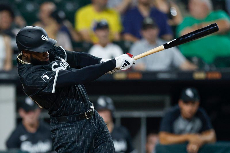 Aug 26, 2024; Chicago, Illinois, USA; Chicago White Sox outfielder Luis Robert Jr. (88) grounds into a force out against the Detroit Tigers during the third inning at Guaranteed Rate Field. Mandatory Credit: Kamil Krzaczynski-USA TODAY Sports