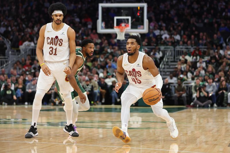 MILWAUKEE, WISCONSIN - JANUARY 24: Donovan Mitchell #45 of the Cleveland Cavaliers handles the ball during a game against the Milwaukee Bucks at Fiserv Forum on January 24, 2024 in Milwaukee, Wisconsin. NOTE TO USER: User expressly acknowledges and agrees that, by downloading and or using this photograph, User is consenting to the terms and conditions of the Getty Images License Agreement. (Photo by Stacy Revere/Getty Images)