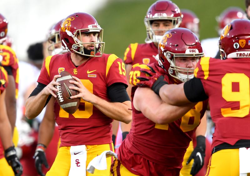 Dec 6, 2020; Los Angeles, California, USA;   USC Trojans quarterback Matt Fink (19) warms up before the game on United Airlines Field at the Los Angeles Memorial Coliseum. Mandatory Credit: Jayne Kamin-Oncea-USA TODAY Sports