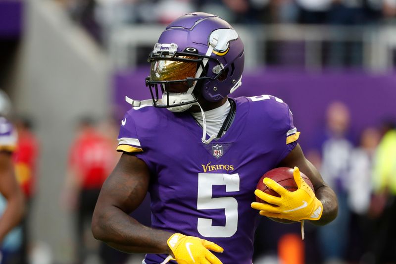 Minnesota Vikings wide receiver Jalen Reagor (5) warms up before an NFL football game against the Dallas Cowboys, Sunday, Nov. 20, 2022, in Minneapolis. (AP Photo/Bruce Kluckhohn)