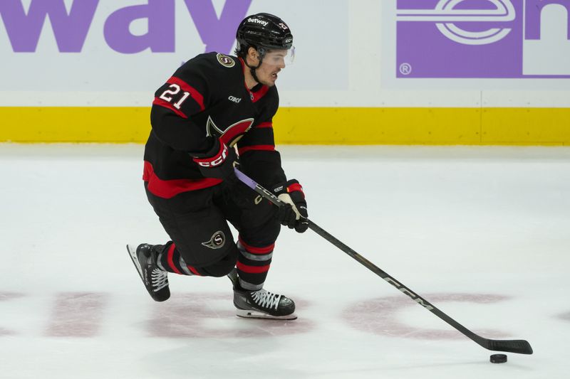 Nov 19, 2024; Ottawa, Ontario, CAN; Ottawa Senators center Nick Cousins (21) skates with the puck in the third period against the Edmonton Oilers at the Canadian Tire Centre. Mandatory Credit: Marc DesRosiers-Imagn Images