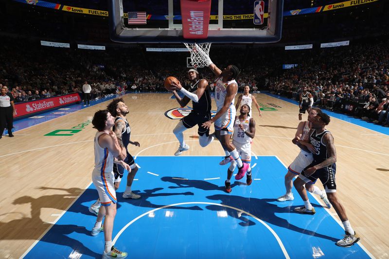 OKLAHOMA CITY, OK - MARCH 14: Jaden Hardy #1 of the Dallas Mavericks drives to the basket during the game against the Oklahoma City Thunder on March 13, 2024 at Paycom Arena in Oklahoma City, Oklahoma. NOTE TO USER: User expressly acknowledges and agrees that, by downloading and or using this photograph, User is consenting to the terms and conditions of the Getty Images License Agreement. Mandatory Copyright Notice: Copyright 2024 NBAE (Photo by Zach Beeker/NBAE via Getty Images)