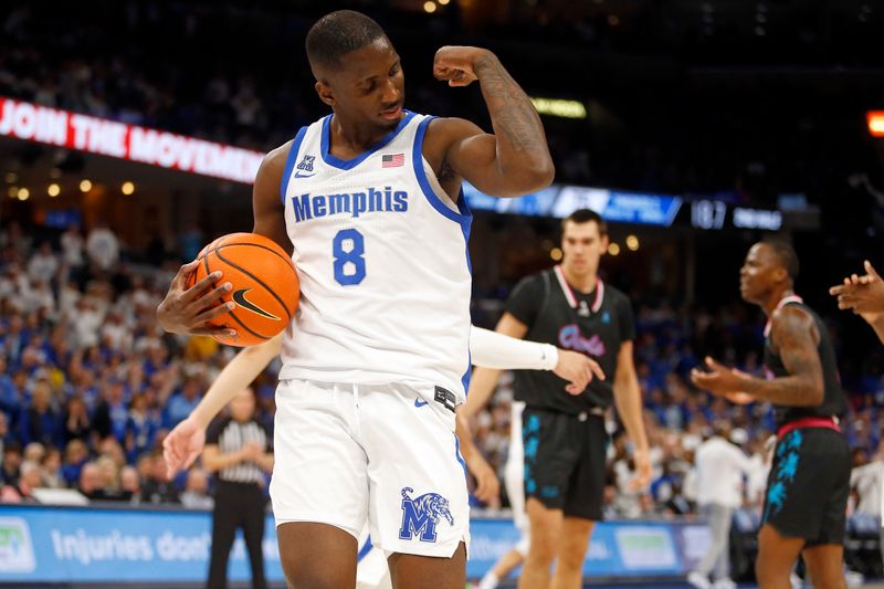 Feb 25, 2024; Memphis, Tennessee, USA; Memphis Tigers forward David Jones (8) flexes after a rebound during the second half against the Florida Atlantic Owls at FedExForum. Mandatory Credit: Petre Thomas-USA TODAY Sports