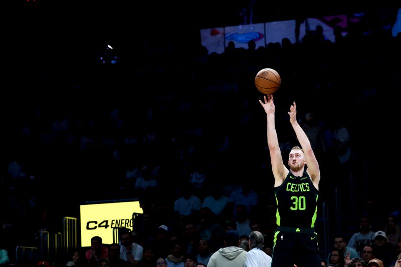 MIAMI, FLORIDA - FEBRUARY 10: Sam Hauser #30 of the Boston Celtics shoots a three point basket against the Miami Heat during the first half at Kaseya Center on February 10, 2025 in Miami, Florida. NOTE TO USER: User expressly acknowledges and agrees that, by downloading and or using this Photograph, user is consenting to the terms and conditions of the Getty Images License Agreement. (Photo by Carmen Mandato/Getty Images)