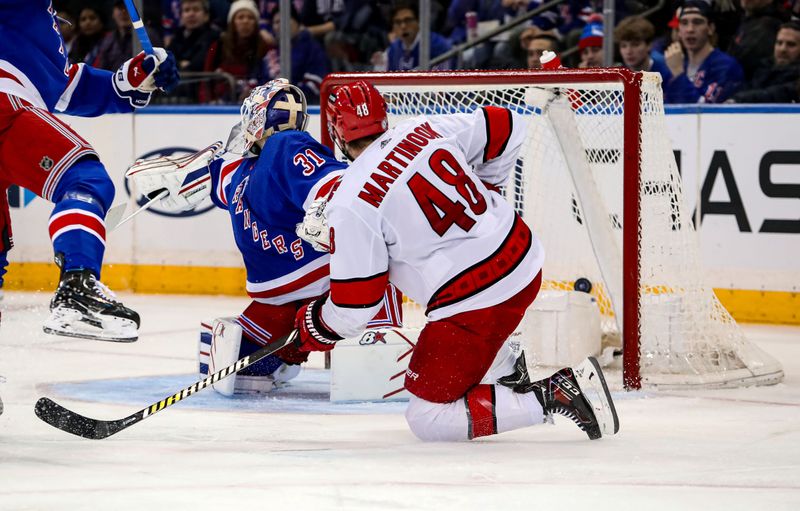 Jan 2, 2024; New York, New York, USA; Carolina Hurricanes left wing Jordan Martinook (48) scores a goal against New York Rangers goalie Igor Shesterkin (31) during the second period at Madison Square Garden. Mandatory Credit: Danny Wild-USA TODAY Sports